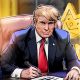 Trump’s use of presidential seal at memecoin event raises legal questions