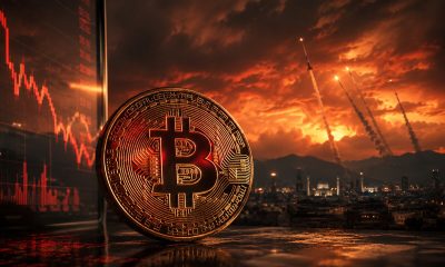 Bitcoin beside a falling market chart and missile-filled skyline, reflecting how the US-Iran ceasefire keeps Bitcoin tied to geopolitical and macro uncertainty