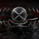 XRP token positioned inside a steel bear trap symbolizing rising leverage risk and tightening crypto market liquidity amid volatility fears